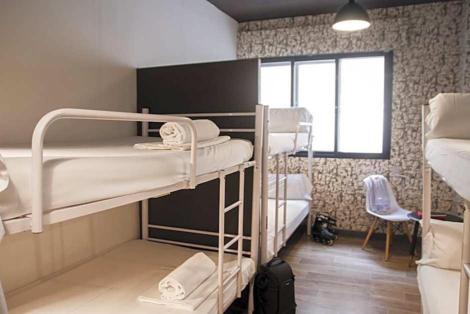 Photo 1 of 7 of Single Bed in 8-Bed Female Dormitory Room with Private Bathroom
