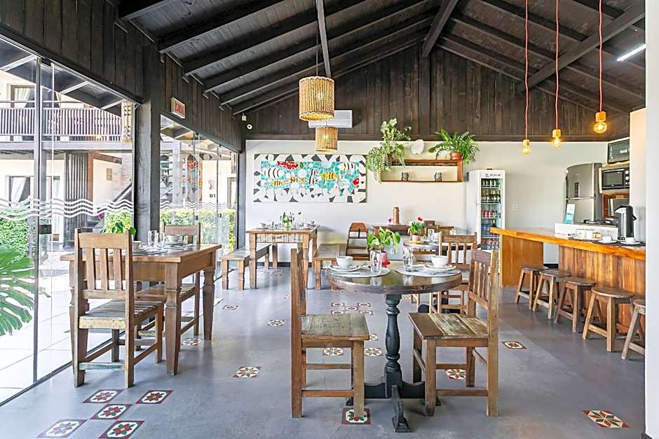 Pousada Rosa 08 - Café da manhã Gourmet, Suítes com Banheira a 150m do Centrinho da Praia do Rosa