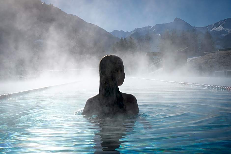 Österreichischer Hof-im Bademantel direkt in die Alpentherme