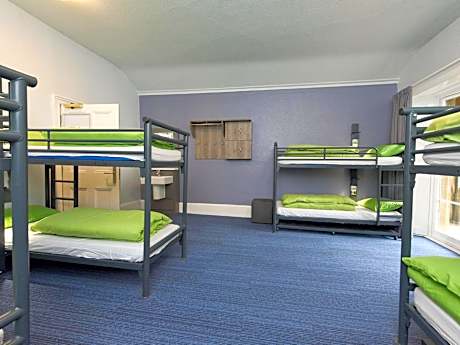 Bunk Bed in Male Dormitory Room with Shared Bathroom