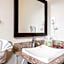 Solaire Inn & Suites