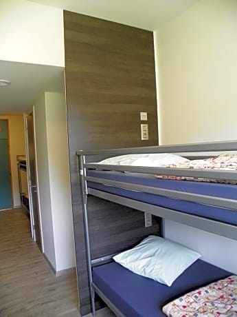 Single Bed in Dormitory Room