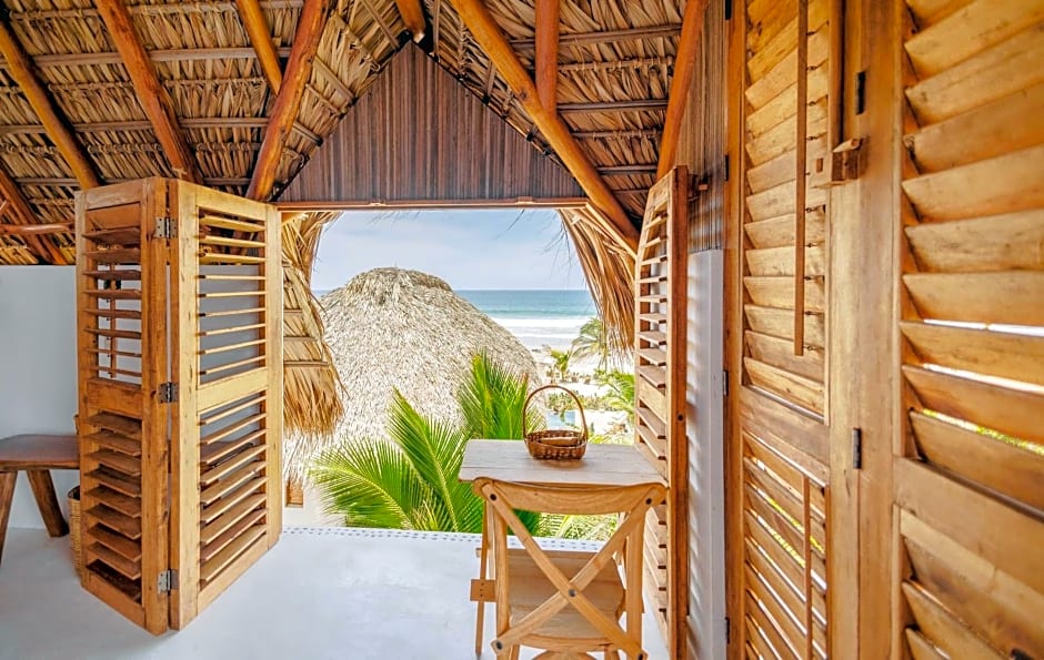 Casa Chula, caba¿as frente al mar