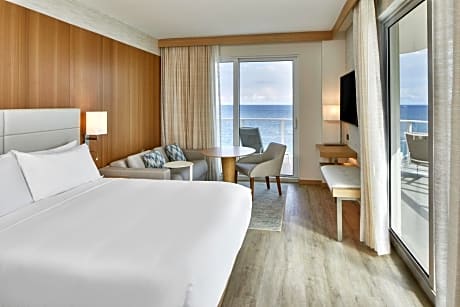 Guest room with king bed, sofa bed, coast view or ocean view and wraparound balcony