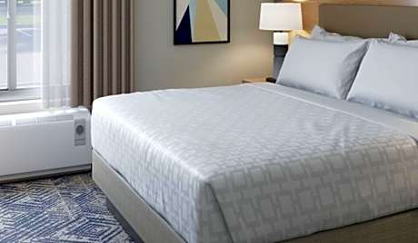 1 King Bed Studio Suite Comm Access Tub