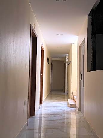 Single Bed in Dormitory Room