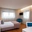 Essence Inn Marianos Hotel