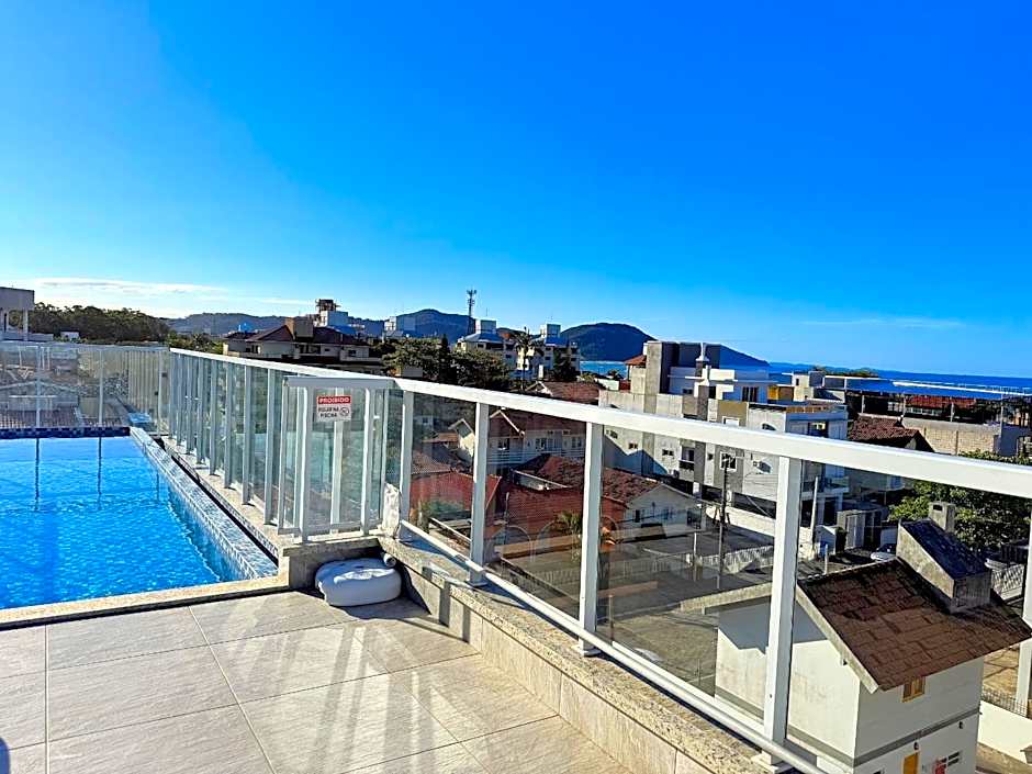 Sol e praia c/ piscina em apto iluminado c/conforto