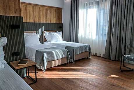 Junior Suite with One Double and Two Single Beds - Non-Smoking