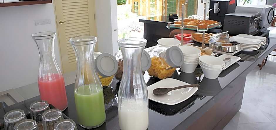 Heeren Palm Suites