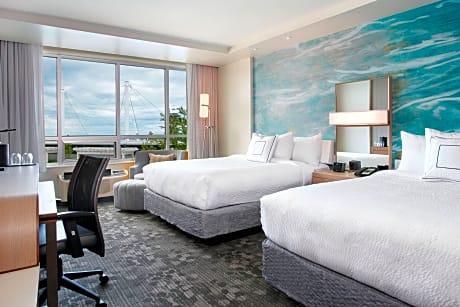 deluxe room with 2 queen beds and bay view