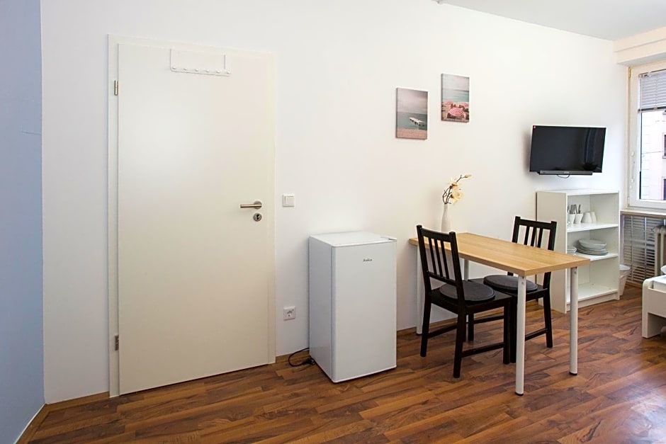 Zentral gelegene Zimmer mit Gemeinschaftsbad und Kuche