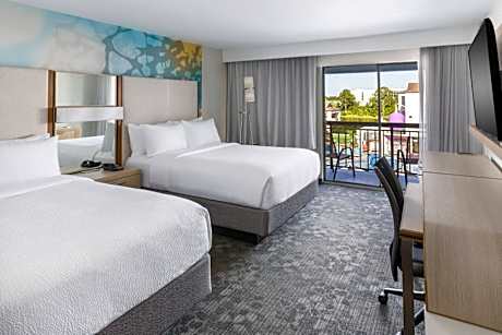 Queen Room with Two Queen Beds, Balcony and Pool View - Hearing Accessible