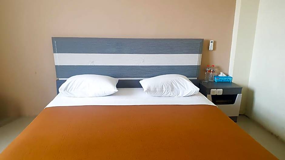 OYO 91266 Markoni 18 Guest House