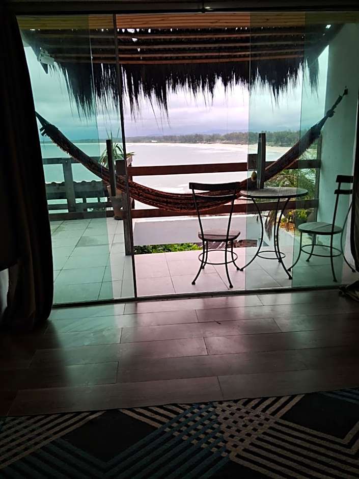 Pousada Marambaia Café - Praiana, econômica, Com café da manhã, piscina ao ar livre e hidromassagem aquecida -Frente para o mar