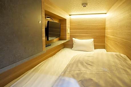 Single Bed in Dormitory Room