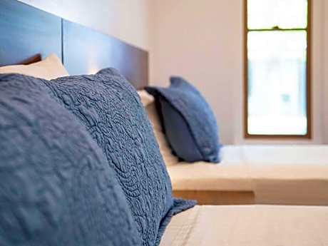 Family Room One Queen and Two Single Beds