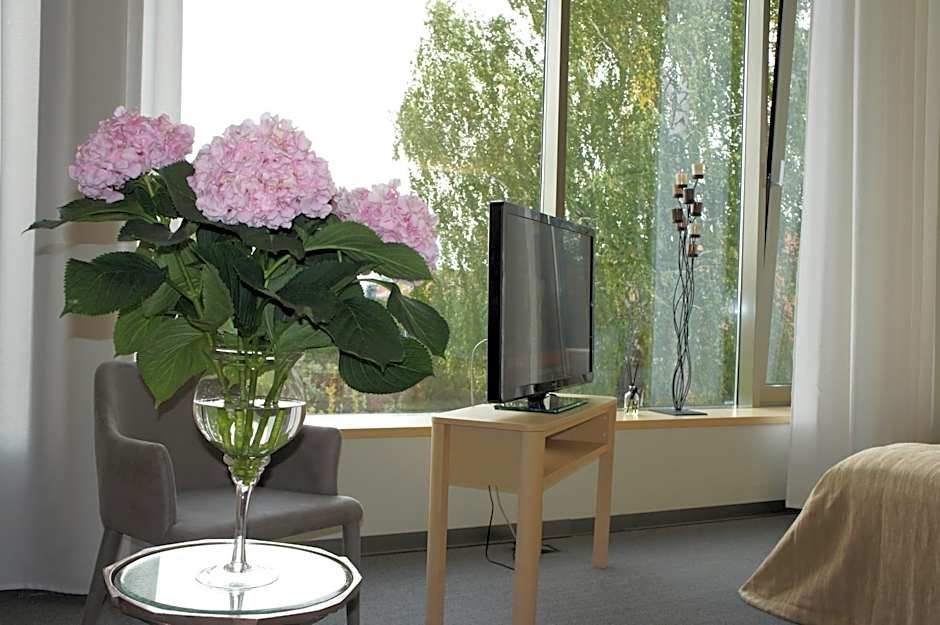Zaliasis slenis - Self check-in hotel - Free parking