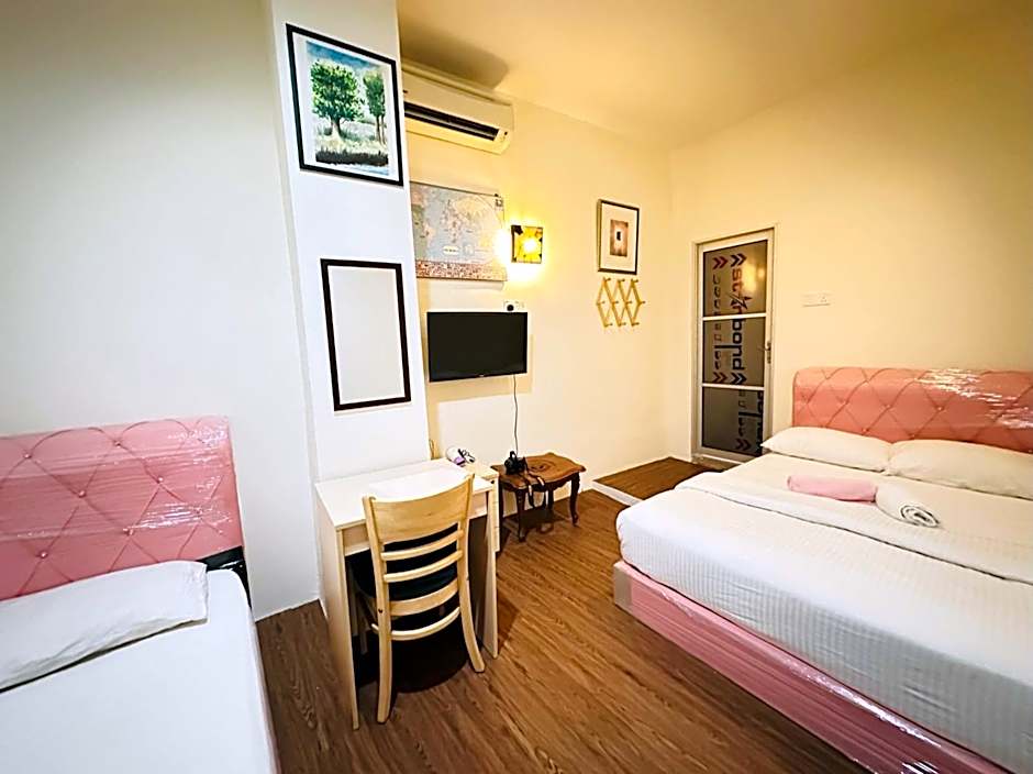 Photo 1 of 13 of Triple Room with Private Bathroom