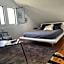 Chambre hôtes nichée sous les toits