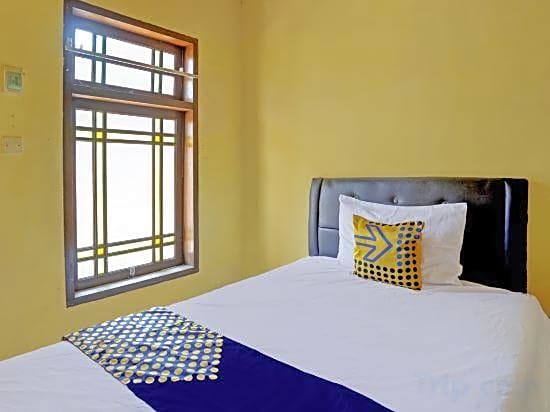 SPOT ON 92480 Iwn Homestay Syariah