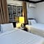 Colony Club Inn & Suites