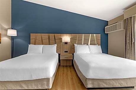 Queen Room with Two Queen Beds and Balcony - Non-Smoking