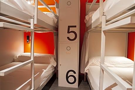 Bed in 9-Bed Mixed Dormitory Room with Private Bathroom