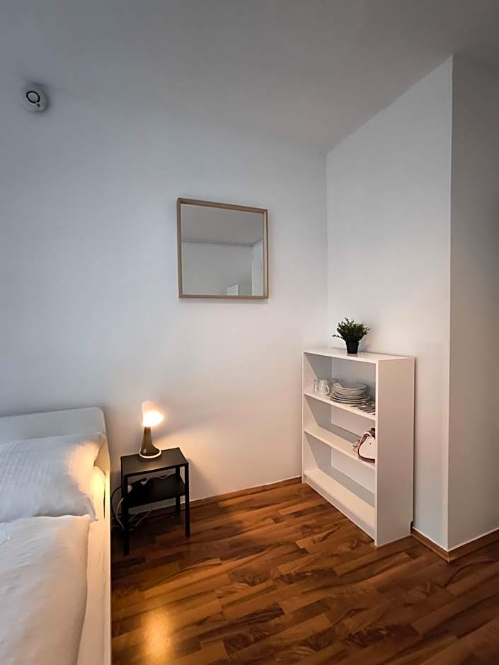 Zentral gelegene Zimmer mit Gemeinschaftsbad und Kuche