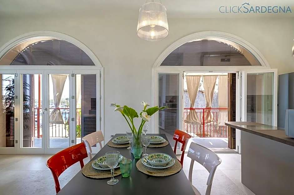 ClickSardinia Alghero Spectacular waterfront Neptune apartment with sea-facing terraces and garden