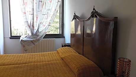 Quadruple Room with Shared Bathroom