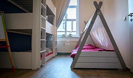 Quadruple Room with Shared Bathroom