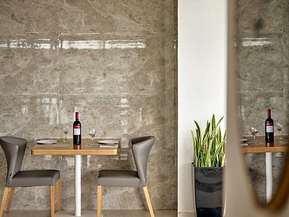 Cavo Orient Beach Hotel & Suites