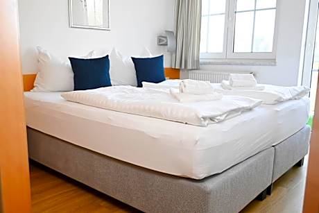 One-Bedroom Apartment with Balcony and Lake View