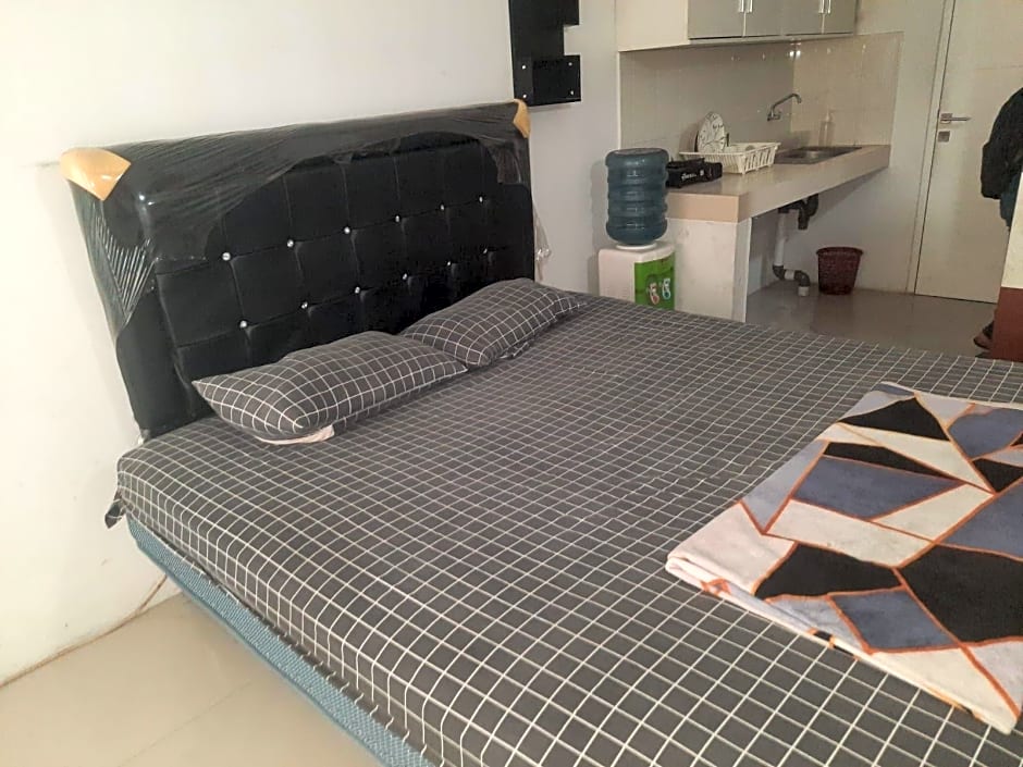 Collection O 93386 Apartemen Grand Sentraland by Mira