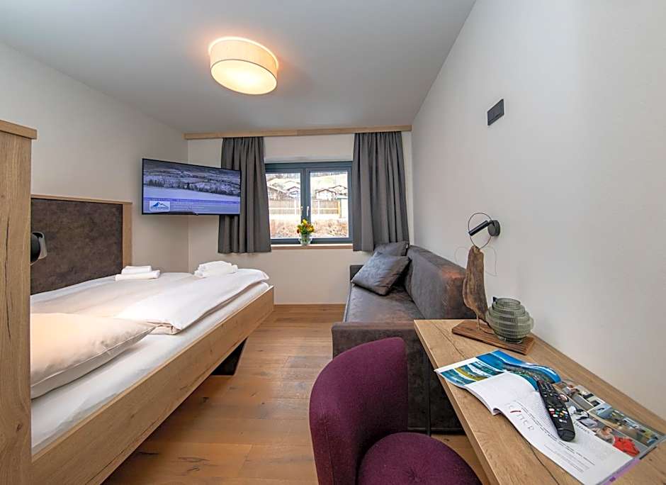 Emma Deluxe Aparthotel direkt beim Skibus ganzjährig beheizter Außenpool