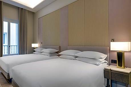 Deluxe Queen Room with Two Queen Beds and Courtyard View