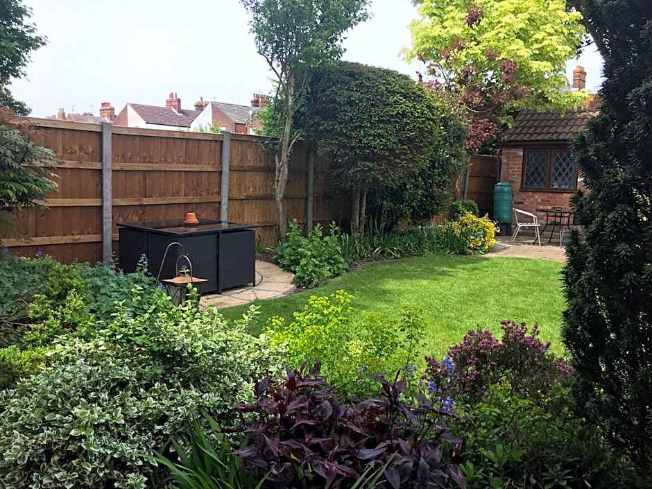 Toothbrush Rooms at Lattice Lodge - Guest Kitchen & EV Recharging