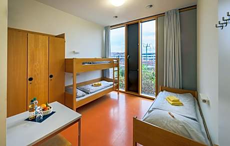 Single Bed in Female Dormitory Room