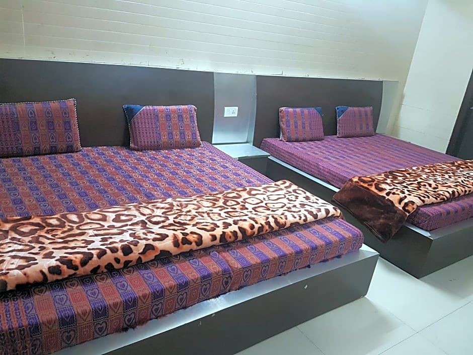 Photo 1 of 1 of Quadruple Room with Fan and Private External Bathroom