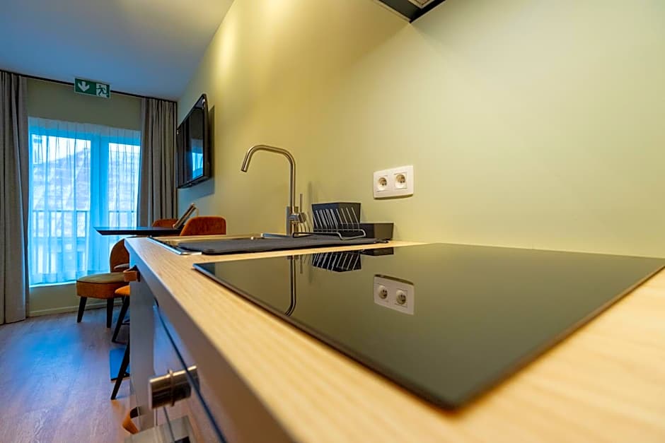 Appart hôtel En Ville