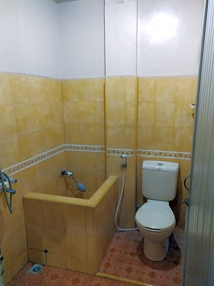 OYO 90487 Wisma Kuta Karang Baru