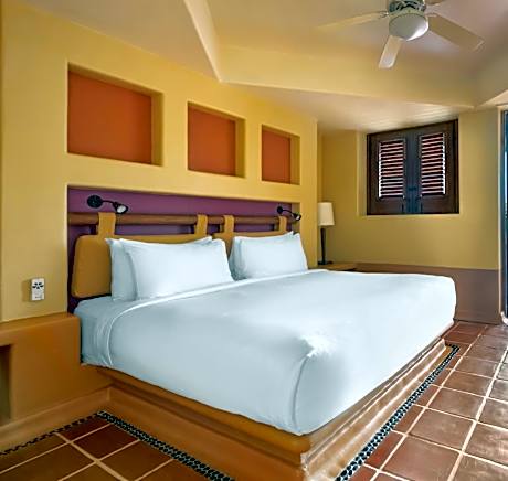 Two-Bedroom King Suite with Two Twin Beds and Partial Ocean View