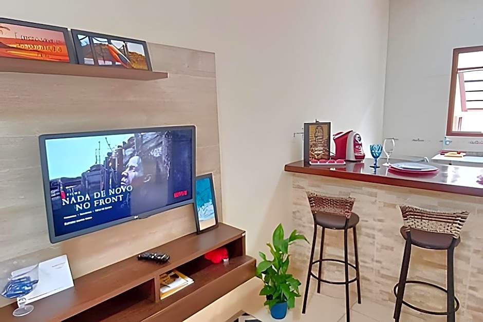 Studio pé na areia com área de churrasco privativa