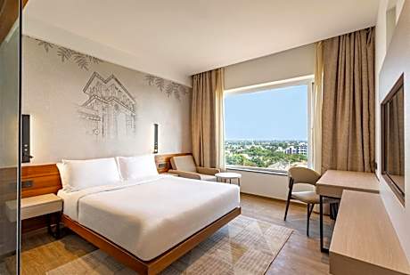 Standard Room with Complimentary Shuttle Pickup and Drop to Sai Baba Temple and Guaranteed early check in and late Check out upto 3 hours (Subject to availability)