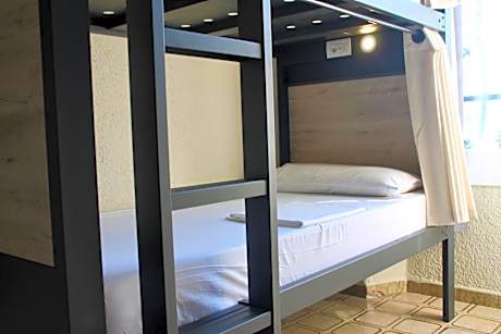 Single Bed in Dormitory Room