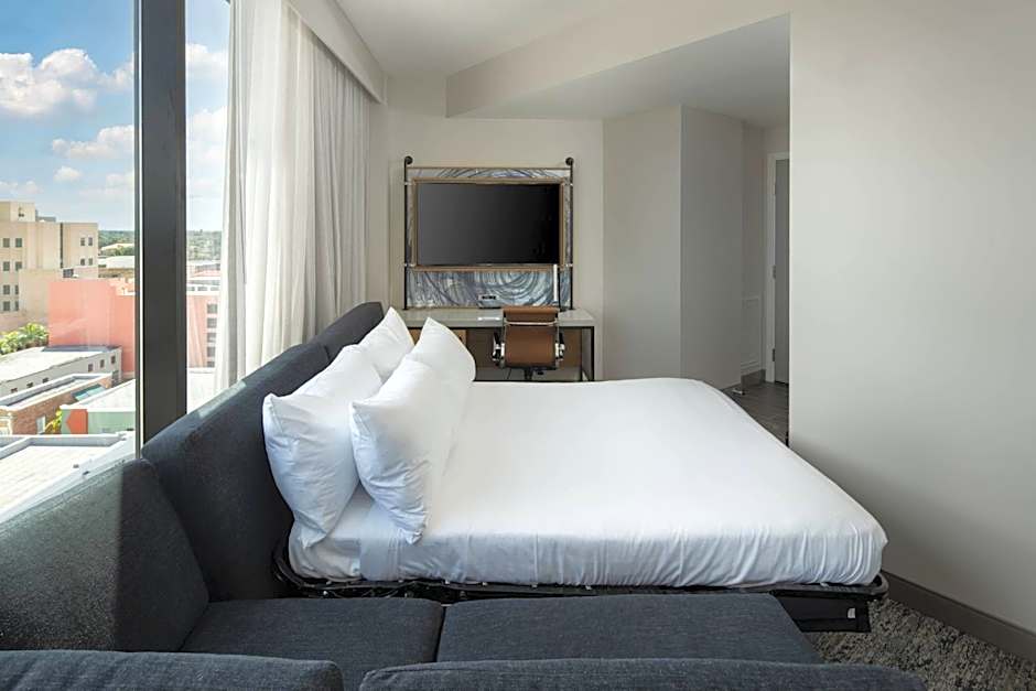 Photo 1 of 7 of Junior 1 King Bed with Sofabed Suite, Balcony