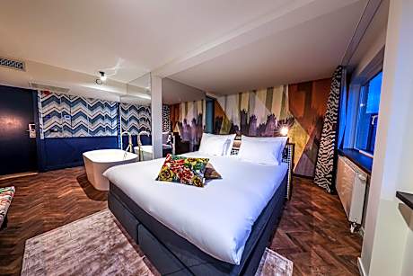 At Hotel Haarhuis. Treat Yourself A Stay In Our Signature Suite Equipped With A Comfortable Design B