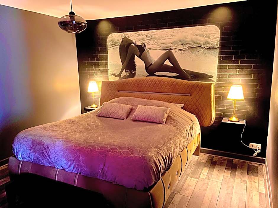 Suite avec Jacuzzi et Sauna Privée