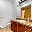 Private apartment with 2 bedrooms, 2 bathrooms, living area, laundry included